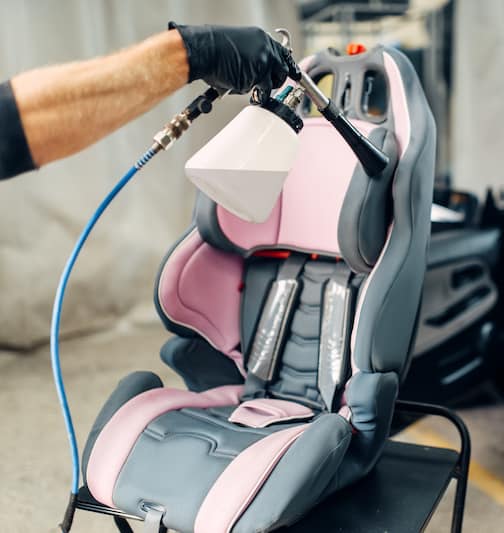 Carwash, removing of dust and dirt from child seat